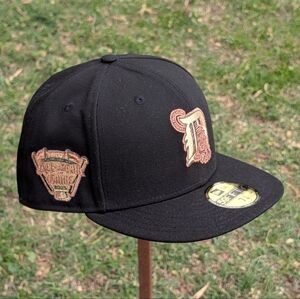 New Era Black Cap with Embroidered Gold Accents